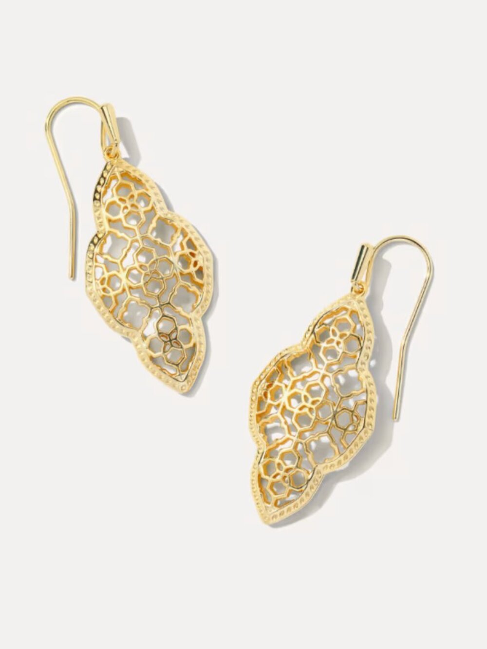 Kendra Scott Abbie drop earrings in gold.
